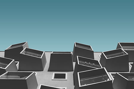 low angle photography of grey building thumbnail