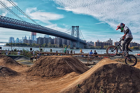 person riding on black BMX bike during daytime thumbnail