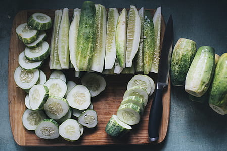 sliced cucumbers on chopping board thumbnail