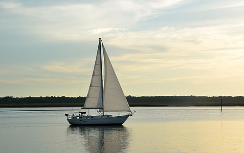 white sailboat in middle of water thumbnail