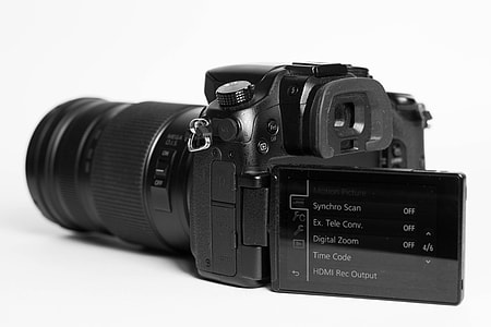 black DSLR camera thumbnail