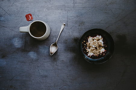 white mug, gray spoon and black bowl thumbnail