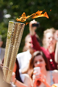 burning brass-colored fire torch thumbnail