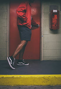 man holding door knob thumbnail