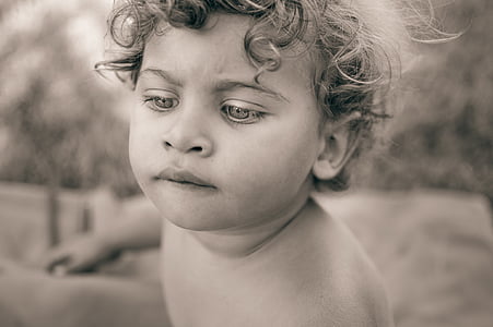grayscale photo of toddler thumbnail