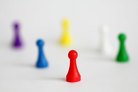 selective focus photography of red chess piece thumbnail