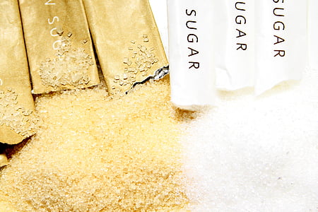 white and brown sugars with packs thumbnail