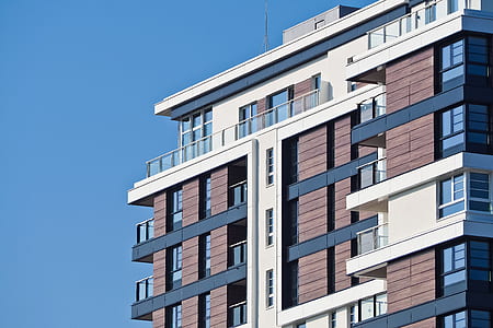 brown and white concrete building thumbnail