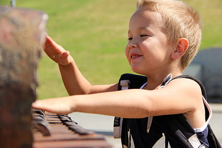 boy tapping table and smiling thumbnail