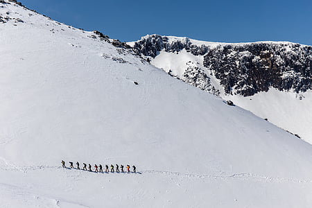 people on snow capped mountain thumbnail