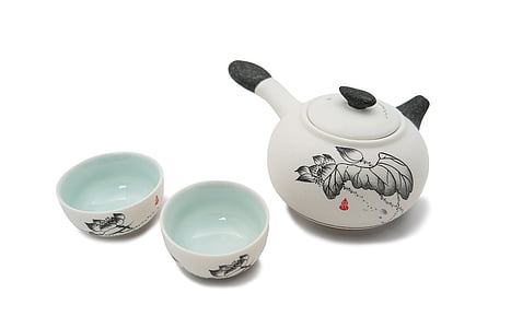 white and black ceramic teapot and bowls thumbnail