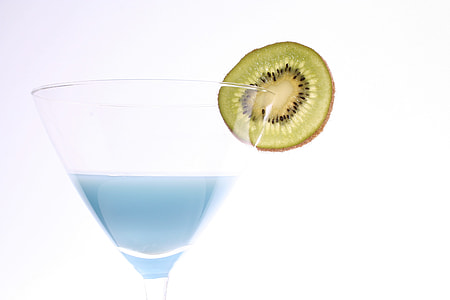 sliced kiwi on clear martini glass thumbnail