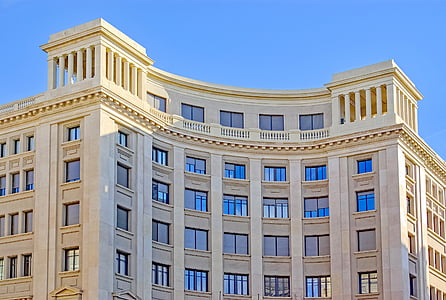 beige building at daytime thumbnail