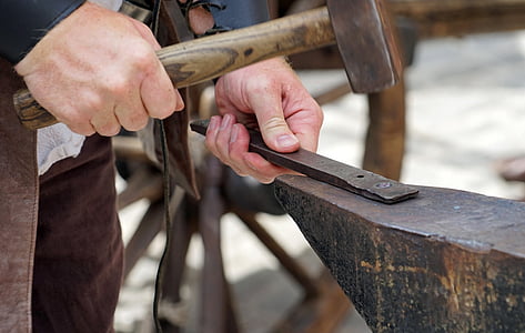 selective focus photography of person using hammer ] thumbnail