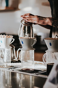 person pouring liquid in cup thumbnail