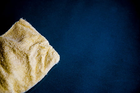 beige and black textiles thumbnail