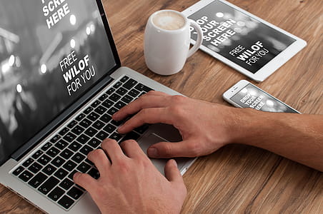 Human Hand on Apple Macbook thumbnail