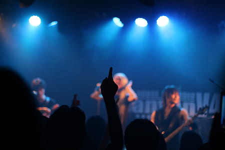 people gathering in concert near stage thumbnail