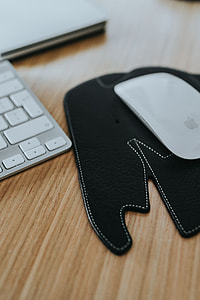 White Apple iMac computer with elephant mousepad thumbnail