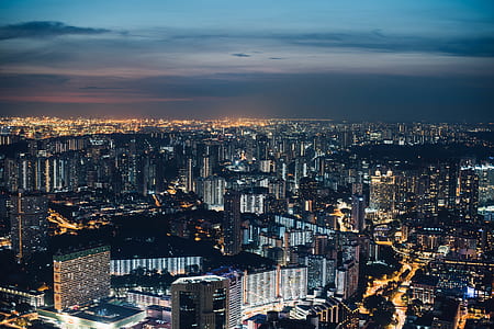 aerial photography of the city at blue hour thumbnail