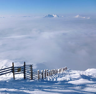 brown wooden fence on glacier mountain thumbnail