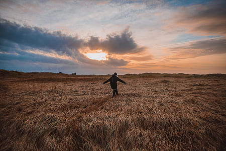 person running on dried grass thumbnail