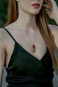 Woman Wearing Black Sleeveless Top thumbnail