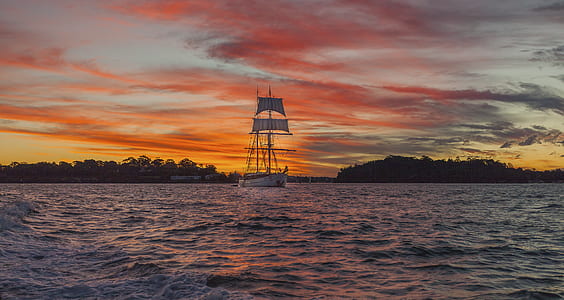 White Boat on Sea during Golden Time thumbnail