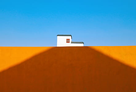 white house on brown field illustration thumbnail