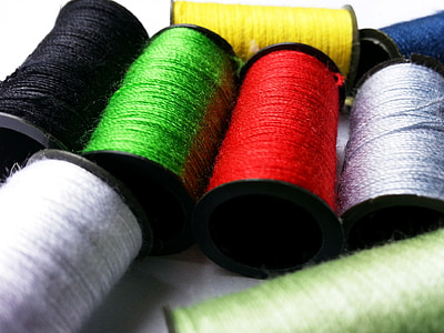 assorted color sewing threads thumbnail