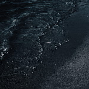 grayscale photo of sand and water thumbnail