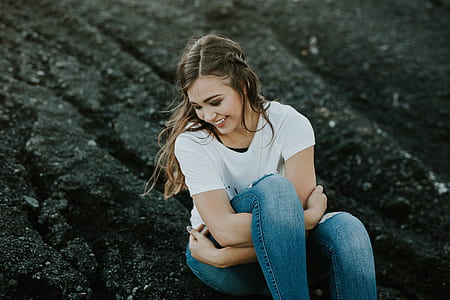 woman sitting on black soil thumbnail