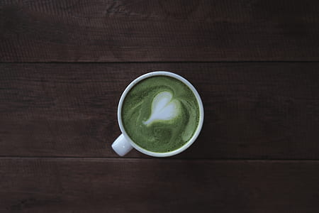 coffee art on white ceramic cup thumbnail