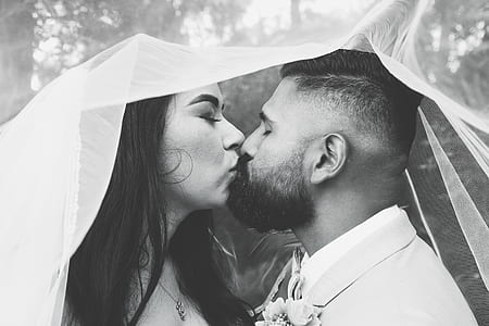 bride and groom kissing thumbnail