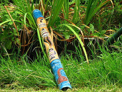 blue blue and beige tiki in grass thumbnail