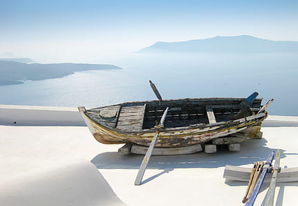 wooden boat on white surface thumbnail