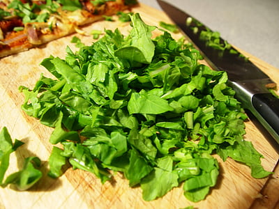 sliced vegetable on brown wooden chopping board thumbnail
