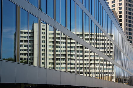 architectural photo of white concrete structure thumbnail