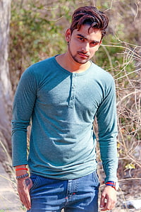 man wearing blue Henley shirt thumbnail
