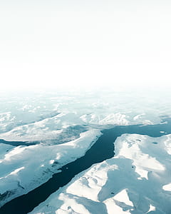 aerial photography of river between glaciers thumbnail