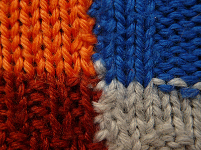 blue, gray, red, and orange knit textile thumbnail