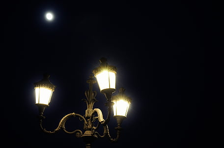 lighted post at nighttime thumbnail