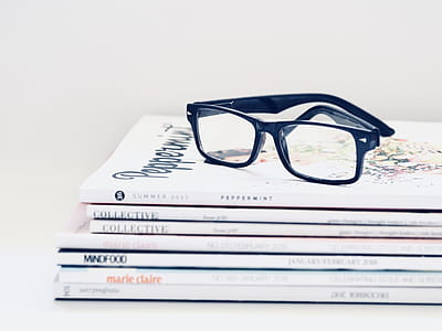 Black Framed Eyeglasses on Seven Collective Books thumbnail