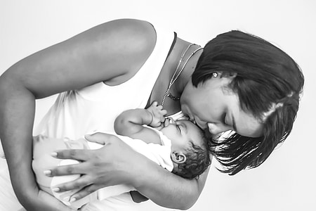 woman carrying baby photo thumbnail