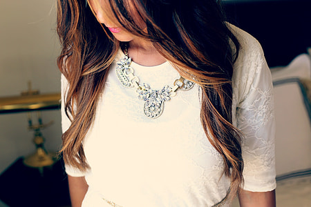 selective focus photography of woman in white dress thumbnail
