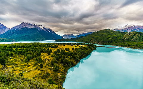 aerial photograph of forest with mountain thumbnail