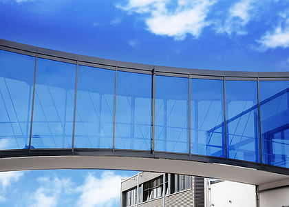 white concrete building with glass window during daytime thumbnail