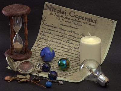 pocket watch, marbles, and white candle thumbnail