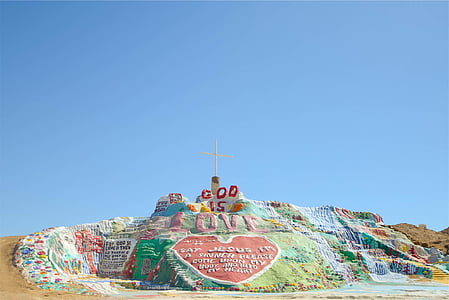 mountain with cross during daytime thumbnail