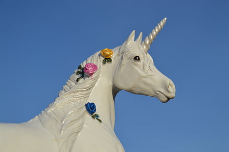 gray unicorn statue during daytime thumbnail